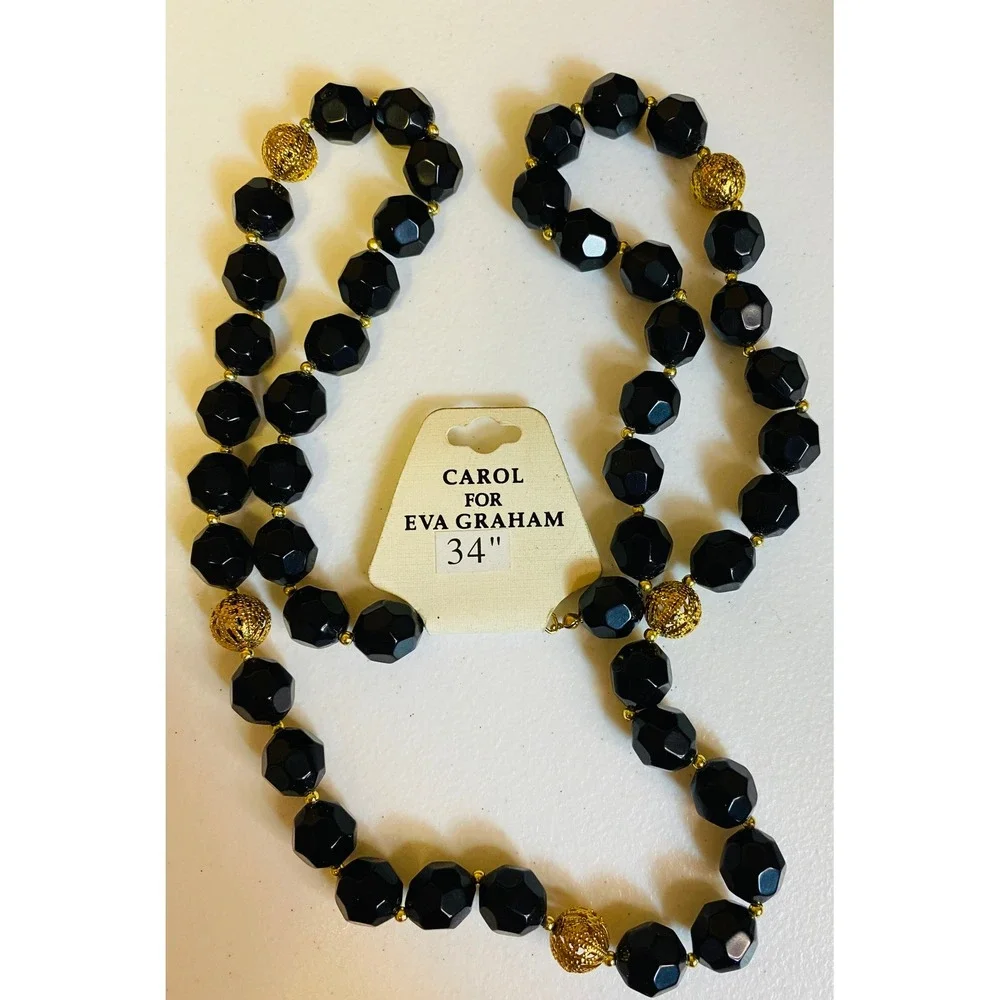 Carol for Eva Graham Black Faceted Beaded Necklace Gold Filigree Accents 34 Inch